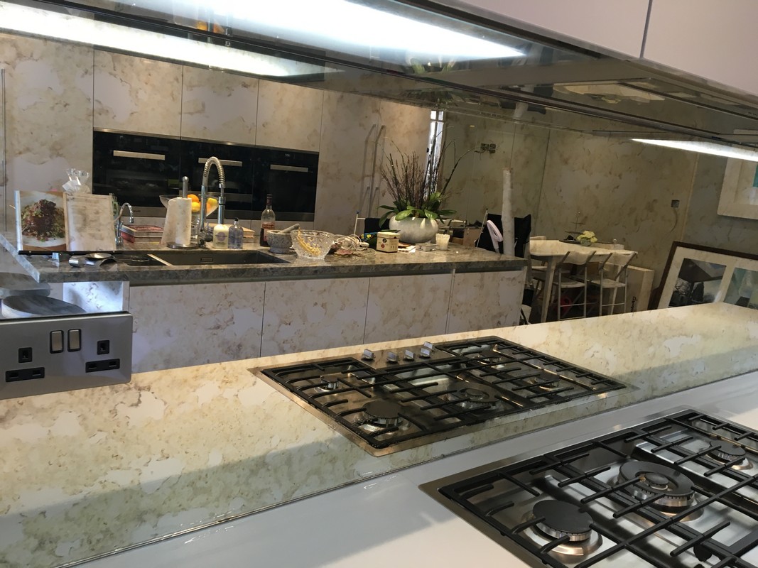 Mirror glass splashback in Edgware luxury kitchen
